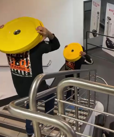Commercial strength-training equipment being prepared for removal